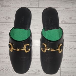 Gucci Black Mules with Gold Hardware